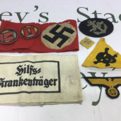 A collection of German WW2 armbands and patches. Shipping category A.