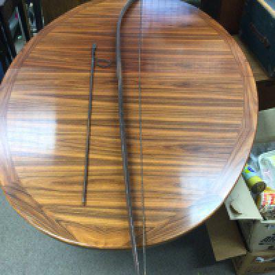 A tribal wooden long bow with an arrow. Bow 200cm long, this lot cannot be posted