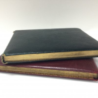 Two books of autograph albums containing various sketches and watercolours including local interest depictions of Leigh old town. Postage category B