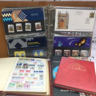 A box of stamps and first day covers. Shipping category D.