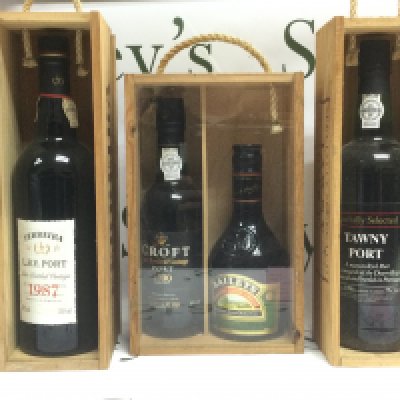 Three boxed bottles of vintage Port. Shipping category D.