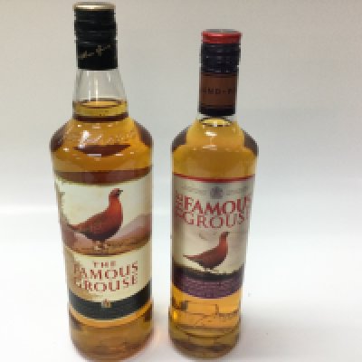 Two bottles of Famous Grouse blended whisky. Both sealed.