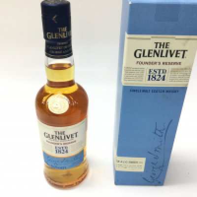 Bottle of Glenlivet single malt whisky. Sealed 350ml with box.