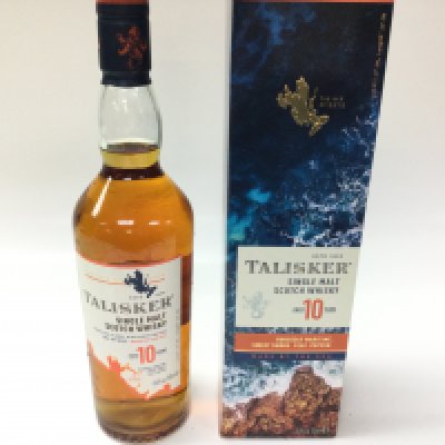 A bottle of Talisker single malt 10 years whisky. 700ml sealed and boxed.