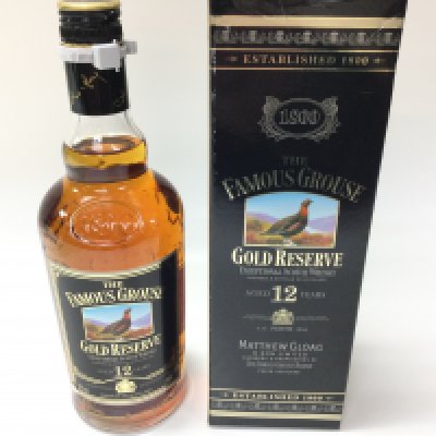 A bottle of Famous Grouse 12 years gold reserve. 700ml sealed and boxed.