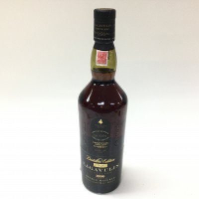 A Lagavulin 1990 special release limited edition bottle of single malt whisky. 700ml sealed bottle.