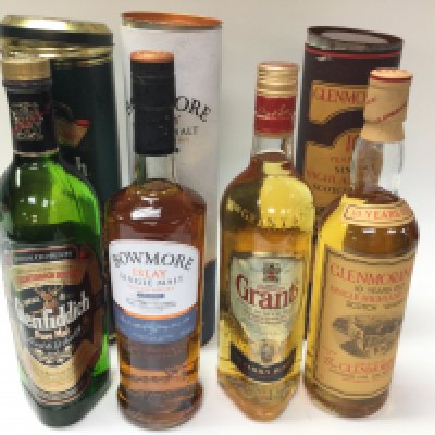 Four bottles of whisky including Glenmorangie glenfiddich etc.