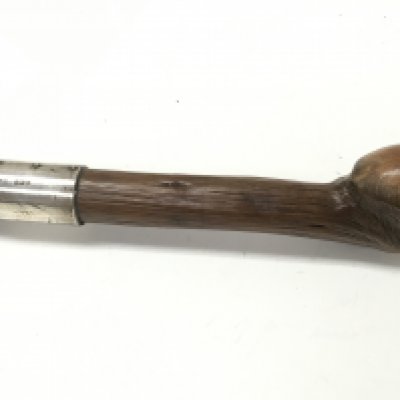 A walking stick with silver collar. 86cm tall.