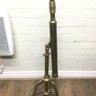A brass telescope on stand, total approx length 90cm. Shipping category D.
