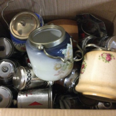 A large collection of chrome tea and sugar storage jars and ceramic biscuits barrels. Postage D