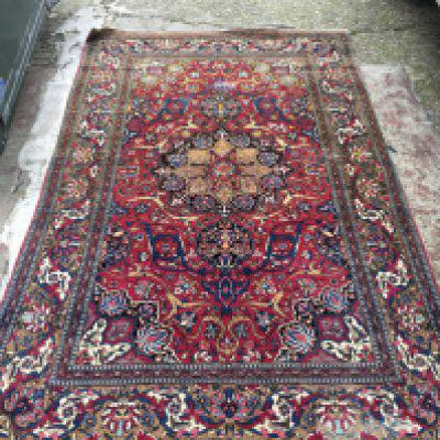 An early Woven rug , dimensions length 226cm width 140cm
