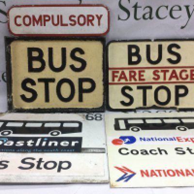 Four bus and coach stop signs plus a destination roller mechanism with attached rolls. Shipping category D.