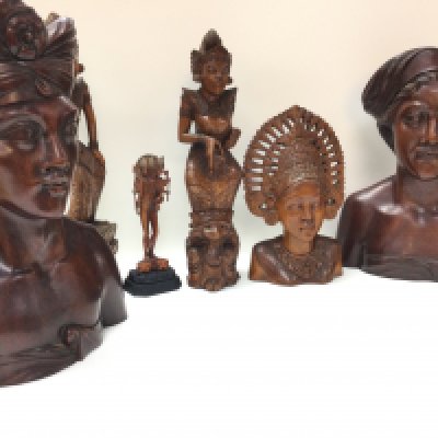 A collection of Indian and Indonesian hardwood carving busts and figures including a Balinese Deity, Bali dancer bust etc. 18 to 33cm tall. postage category C