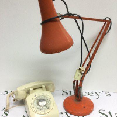 A vintage anglepoise lamp and rotary dial telephone (2).