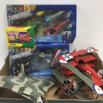 Two boxes of mainly models of aircraft, two boxed Thunderbirds vehicle sets and a boxed Corgi crane set. Shipping category D.