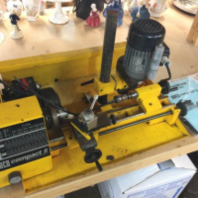 An Emco Compact 5 lathe with manual. This lot cannot be posted