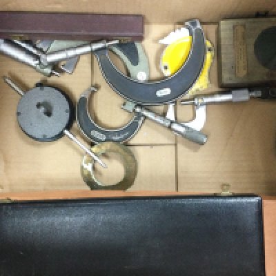A collection of micrometers including Starrett, Moore & Wright etc. also including some other items including an AA badge, gun cleaning kit etc