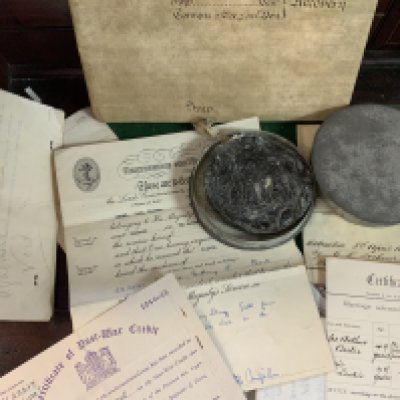 A George III wax seal and indenture together with a small collection of documents.