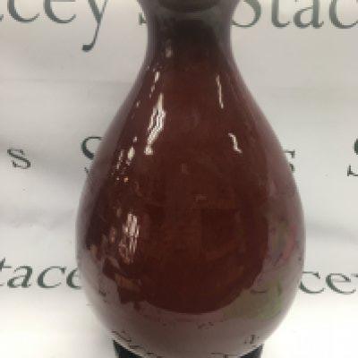 A large Sag De Boeuf vase raised on a carved hardwood base, approx total height 40cm. Six character marks to base. Shipping category D.