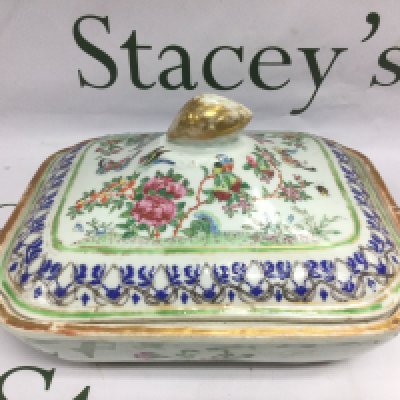 A Chinese famille rose tureen and cover decorated with insects and foliage, approx width 24cm. Shipping category D.