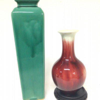 A large Chinese green glazed 20th century vase of square tapering shape Hight 43cm and a sang de boeuf vase (2) no obvious damage no reserve.