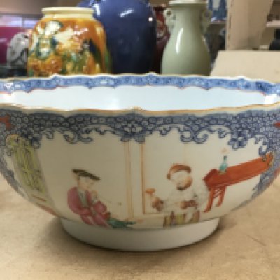 A 19th Century Chinese blue and white bowl, decorated with figures, flowers and foliage. No visible damage or restoration. 23cm across