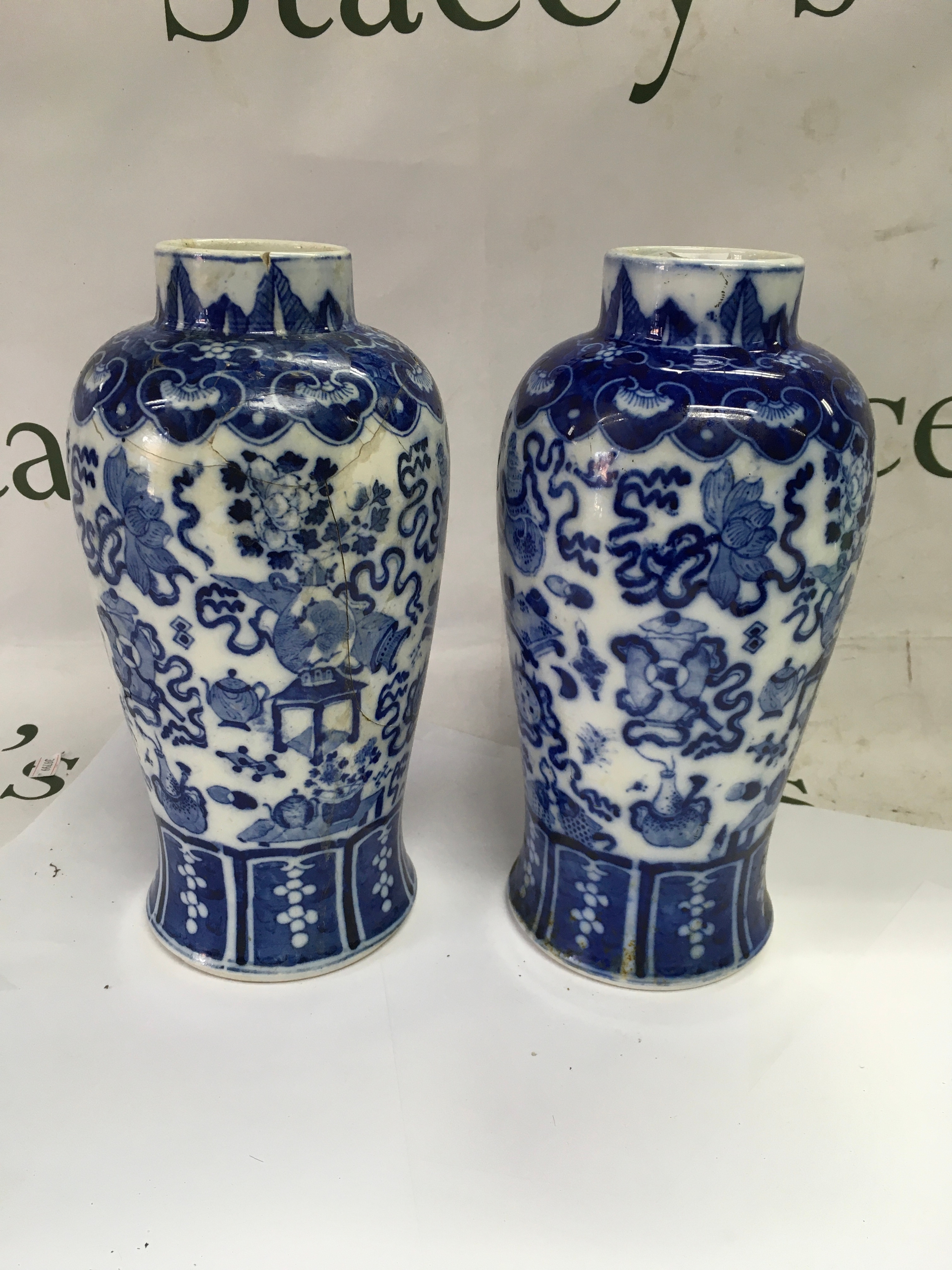 A pair of 19th century Chinese blue and white porcelain vases. Height 26cm.