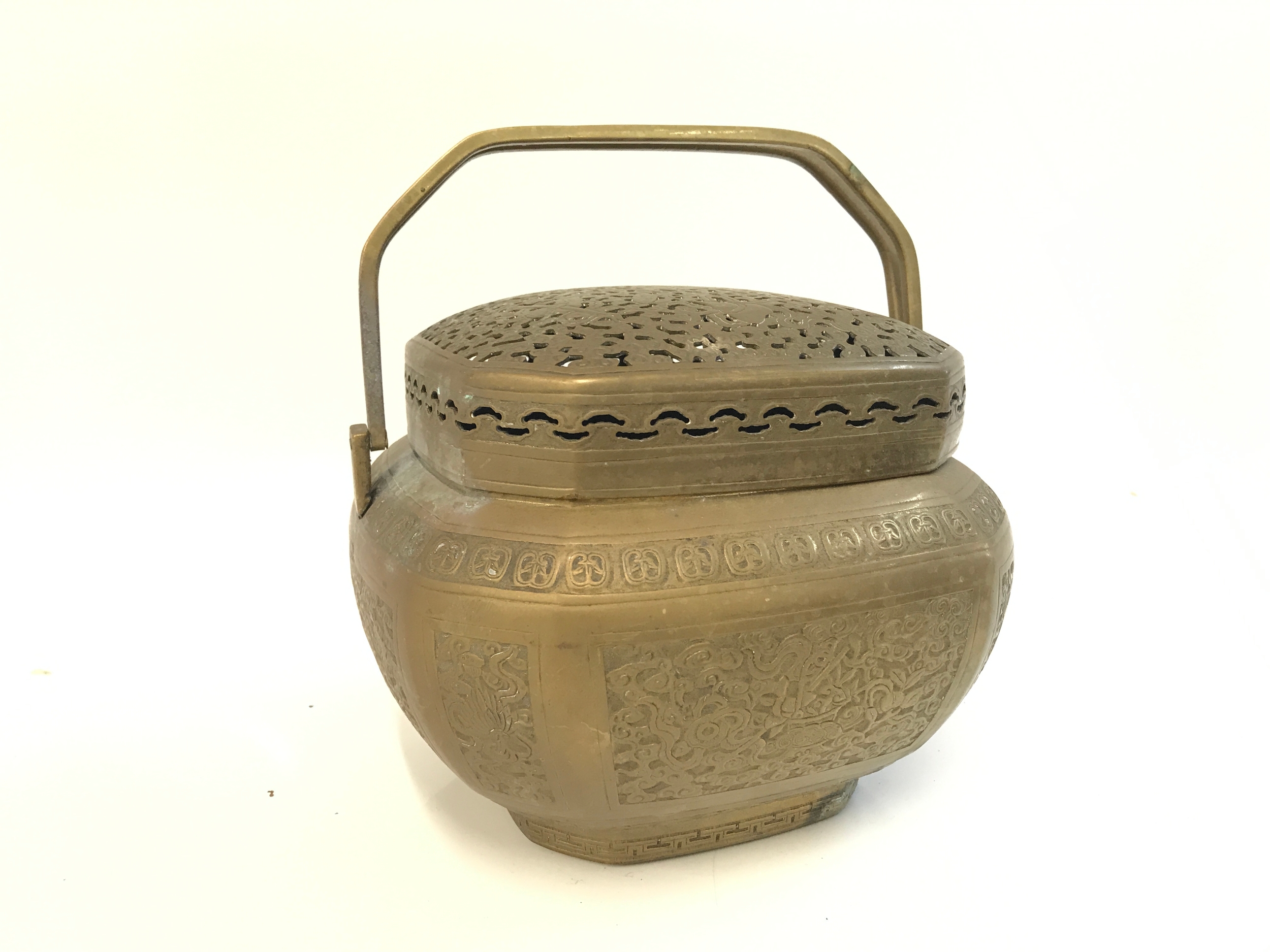 A Chinese brass hand warmer with a six character mark at base. 19cm tall, 17cm wide , 17cm long 