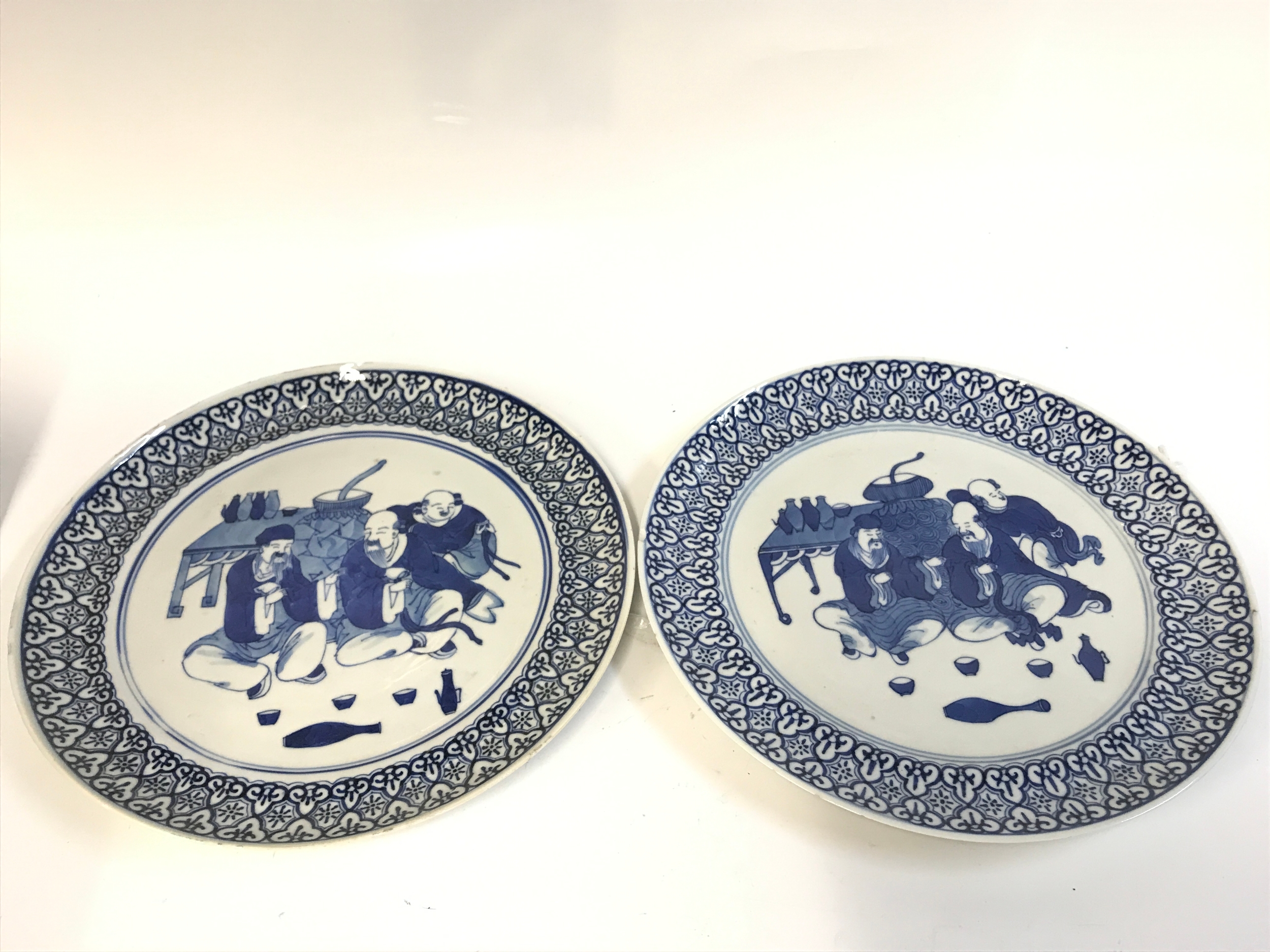 A pair of Chinese blue and white plates , 24cm wide 
