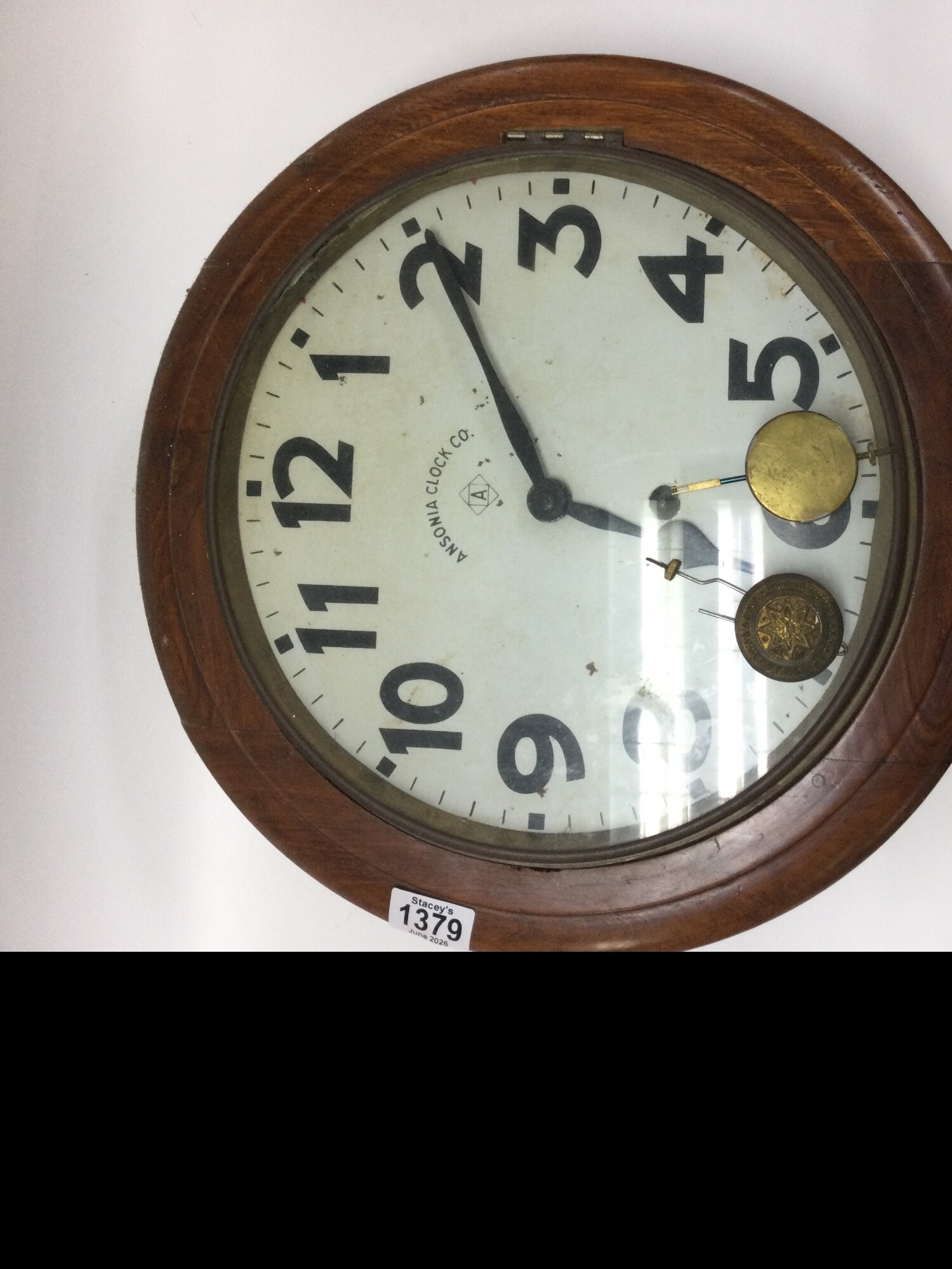 Ansonia clock.Co antique wall clock schoolhouse/office/railway station style, dating 1890s-1920s with a solid oak case TO BE SOLD WITHOUT RESERVE