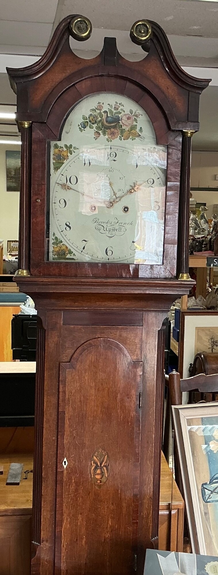 An early 19th century long cased clock