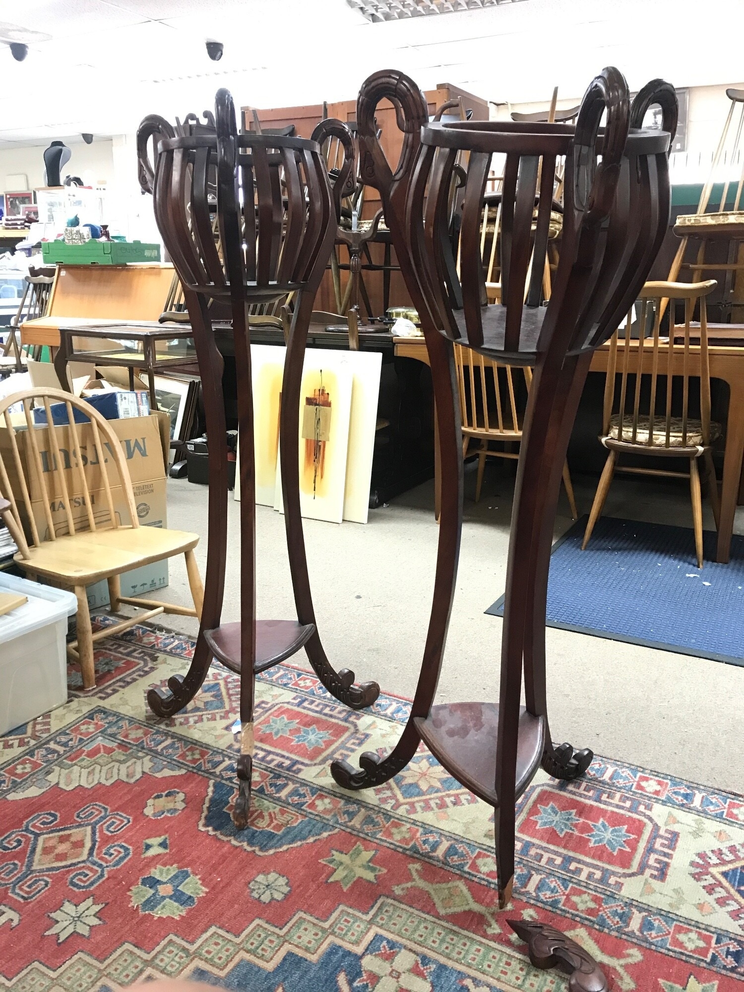 A pair of reproduction mahogany Jardiniere stands, damaged. 128cm tall, 31cm wide inside space TO BE SOLD WITHOUT RESERVE