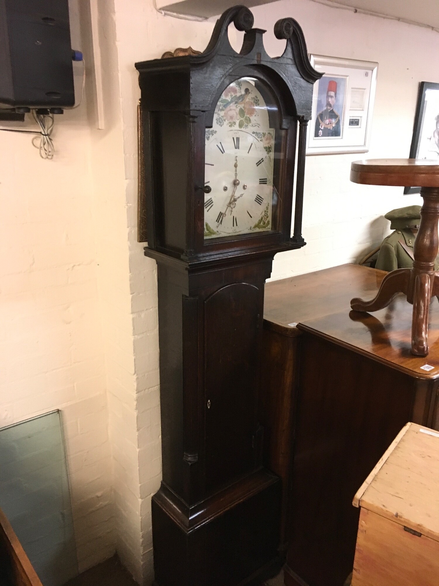 An oak Long case clock with 8 day movement and a painted dial, approx height 212cm.