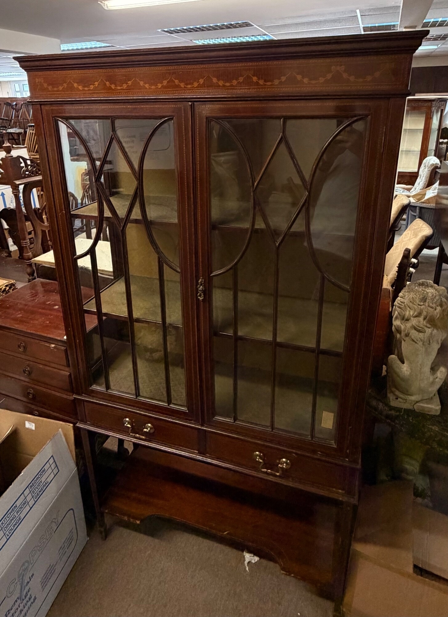 A glazed Edwardian display cabinet with inlaid decoration. TO BE SOLD WITHOUT RESERVE