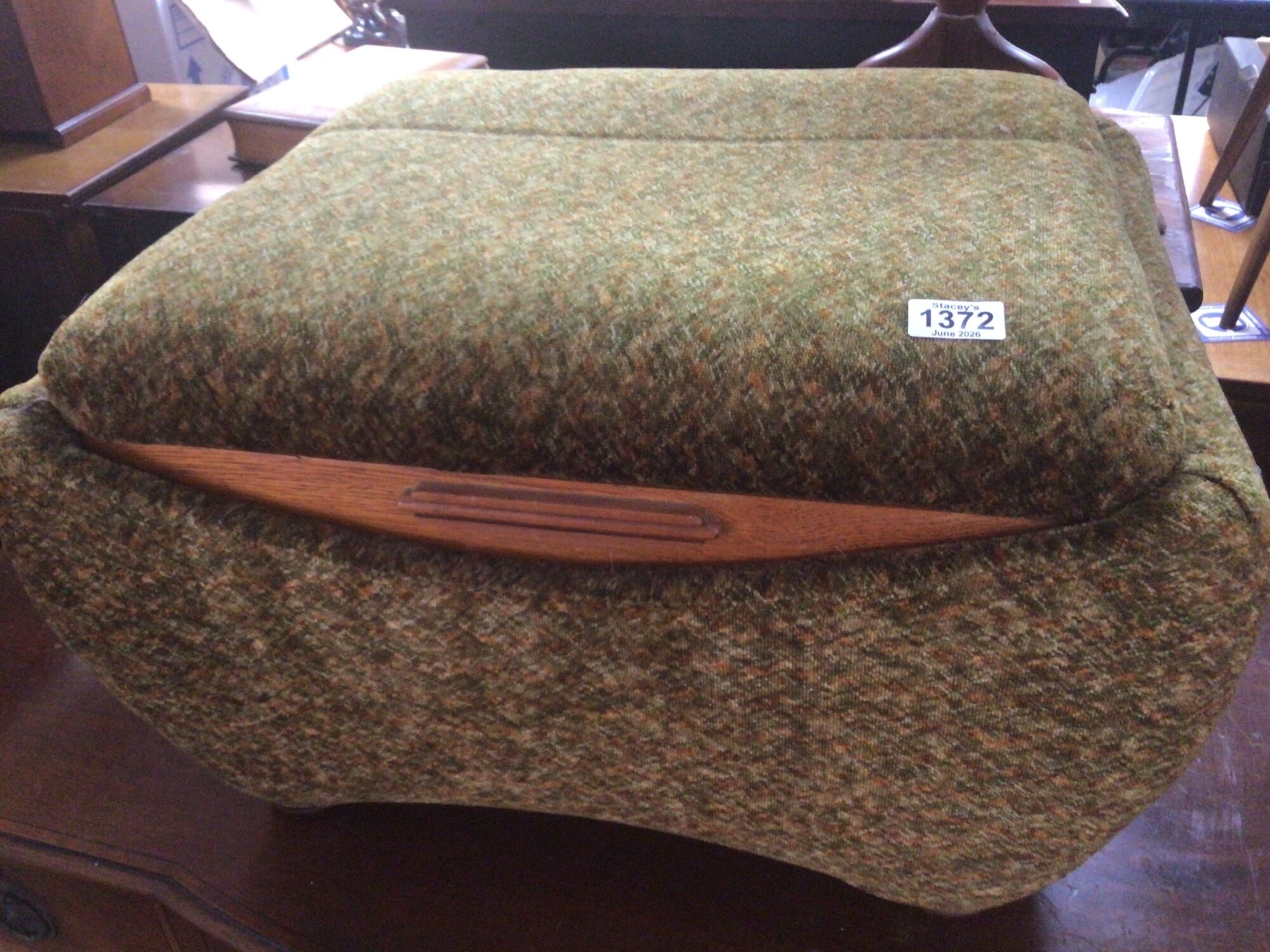 An Art Deco upholstered lounge box with an oak edge and hinged top. TO BE SOLD WITHOUT RESERVE