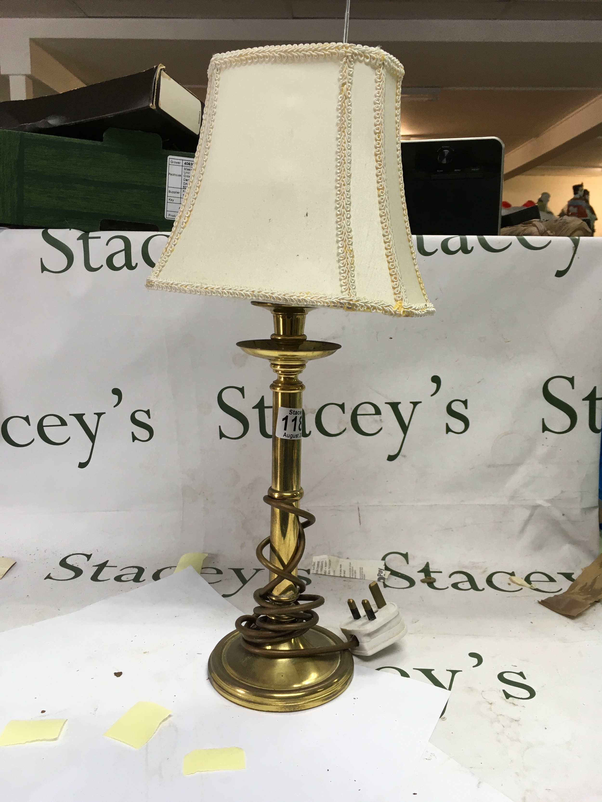 Vintage brass candlestick table lamp with a fabric lampshade  
