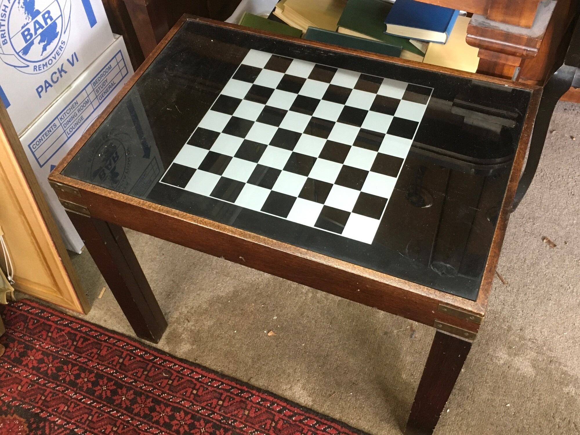 Games table with games pieces under top. 50cm tall ,61cm wid TO BE SOLD WITHOUT RESERVE