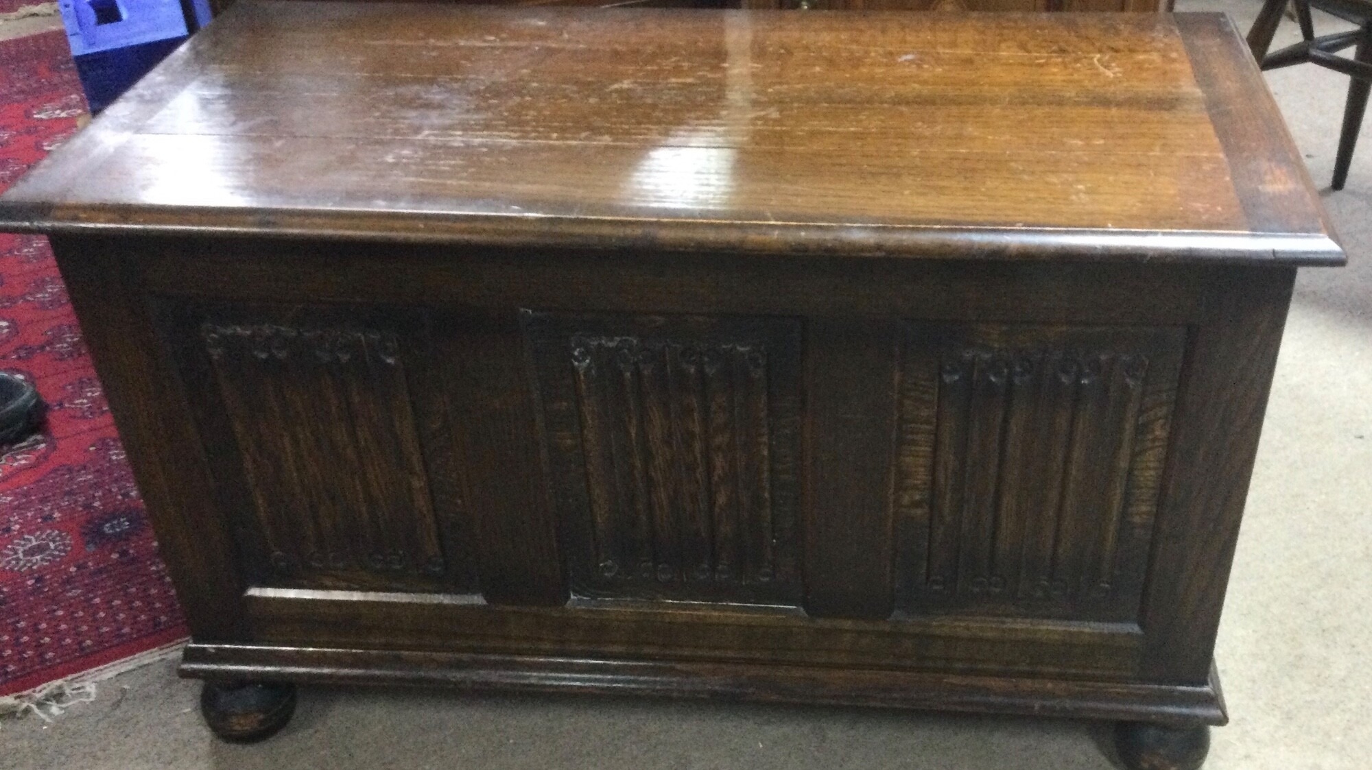 A blanket box, chest of draws and a cabinet made from oak.