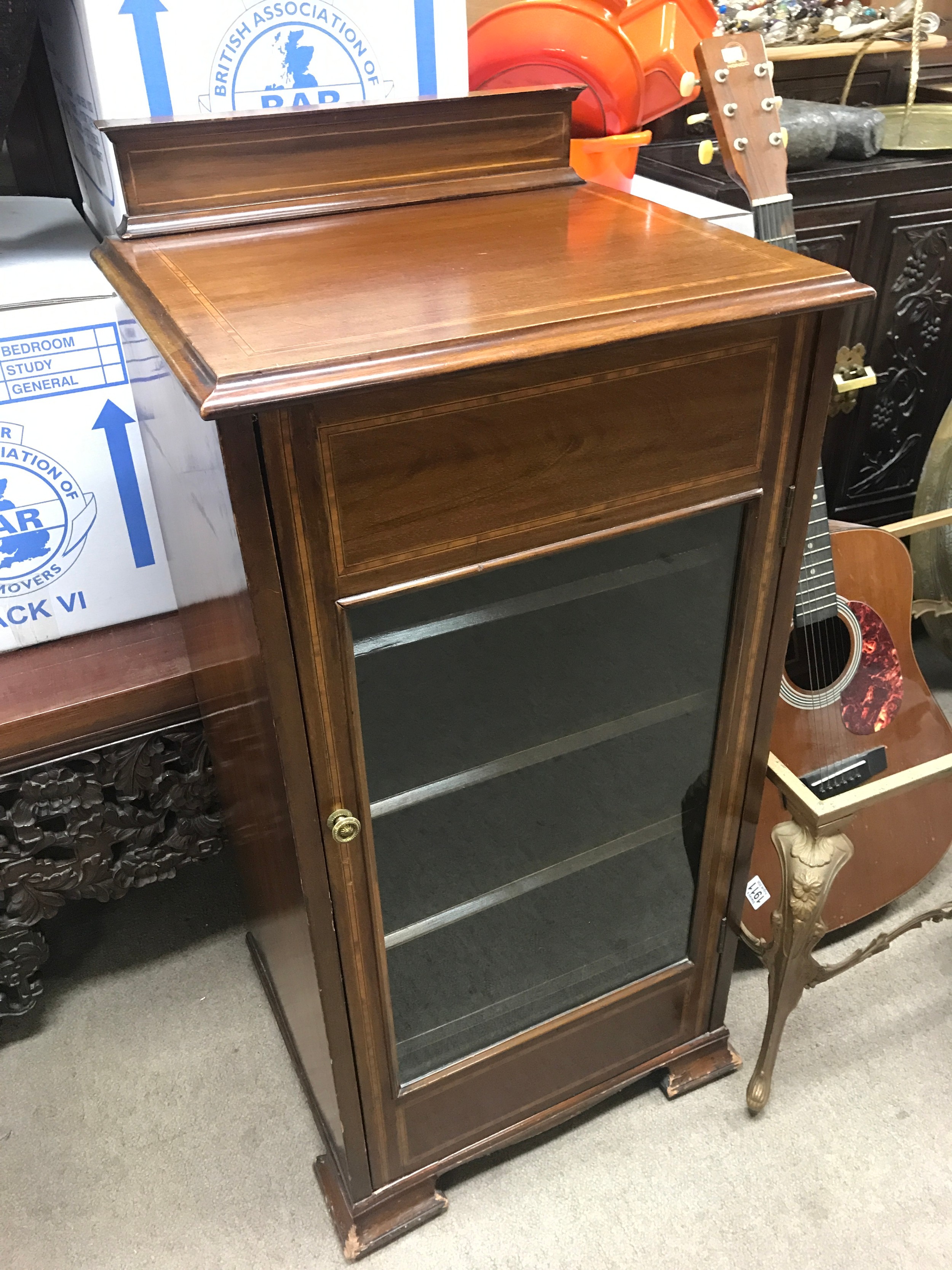 A music cabinet. 47cm wide 38cm long 98cm tall