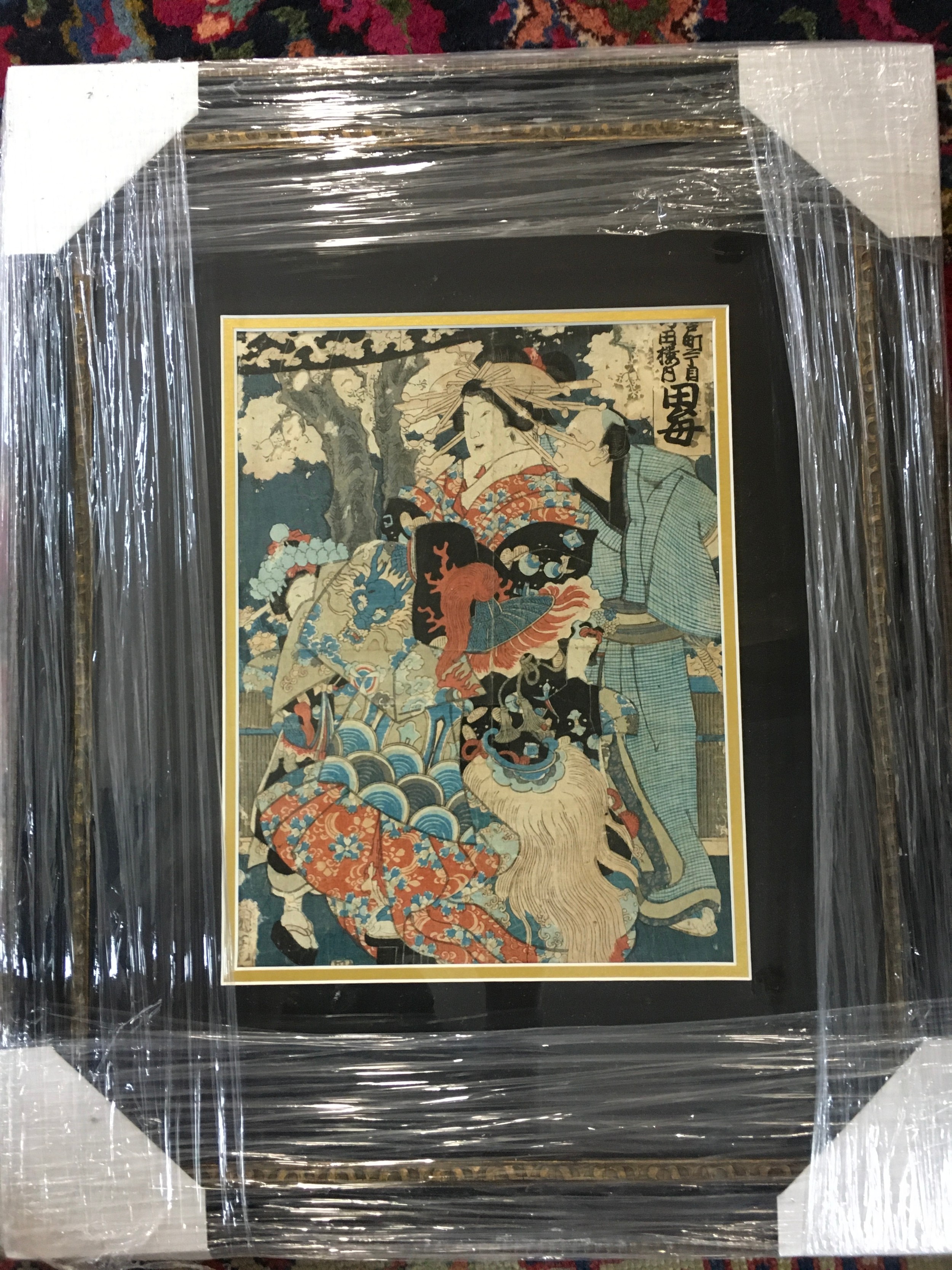 A Japanese art print, kabuki scene with a courtesan. Frame 46x58cm. picture dimensions 25x34cm