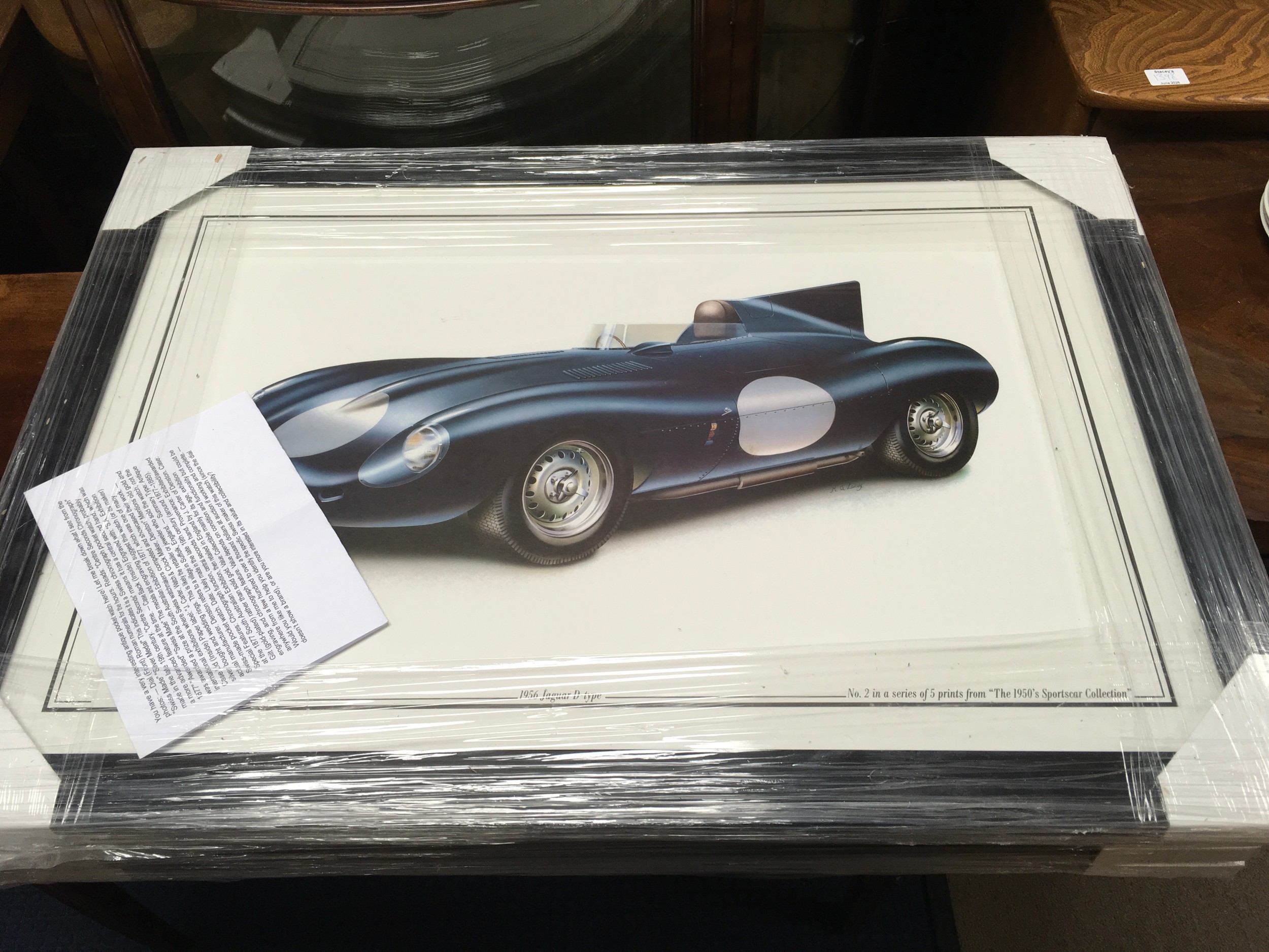 Five limited edition racing prints, "The 1950s Sportscar collection" including Ferrari, Aston Martin etc by artist M.A.Lacey. Frame dimensions 78x55cm