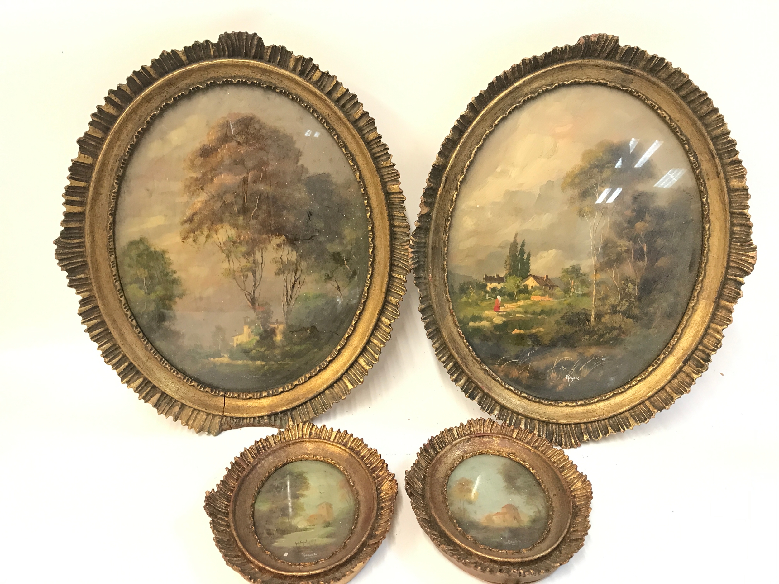 Four framed oval oil on copper oil paintings depicting rural landscapes signed Tesson, Roger's etc. 15x18cm & 30x35cm