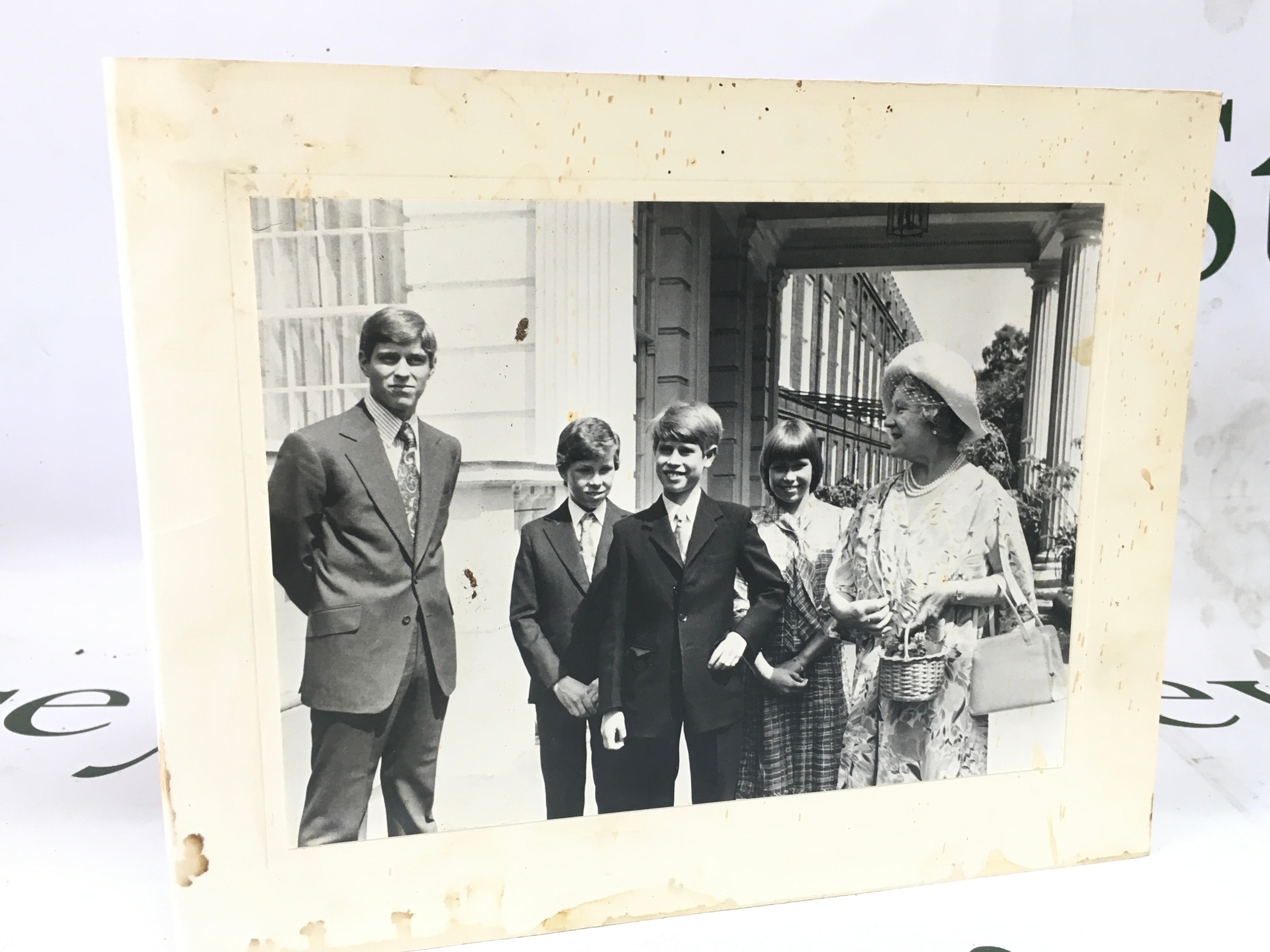 Signed Her Majesty Queen Elizabeth II Christmas card 1976, with black and white photograph of The Queen Mother outside Clarence House with TRHs Princes Andrew and Edward, Lady Sarah Armstrong-Jones and David, Viscount Linley, Signed 'from Elizabeth R' 235mm x 186mm with envelope [hand delivered at Clarence House] Provenance: Sgt Daniel Owen Bowen RVM, Welsh Guards 1944-1968; member of Royal Household Clarence House 1968-1986, thence by descent.