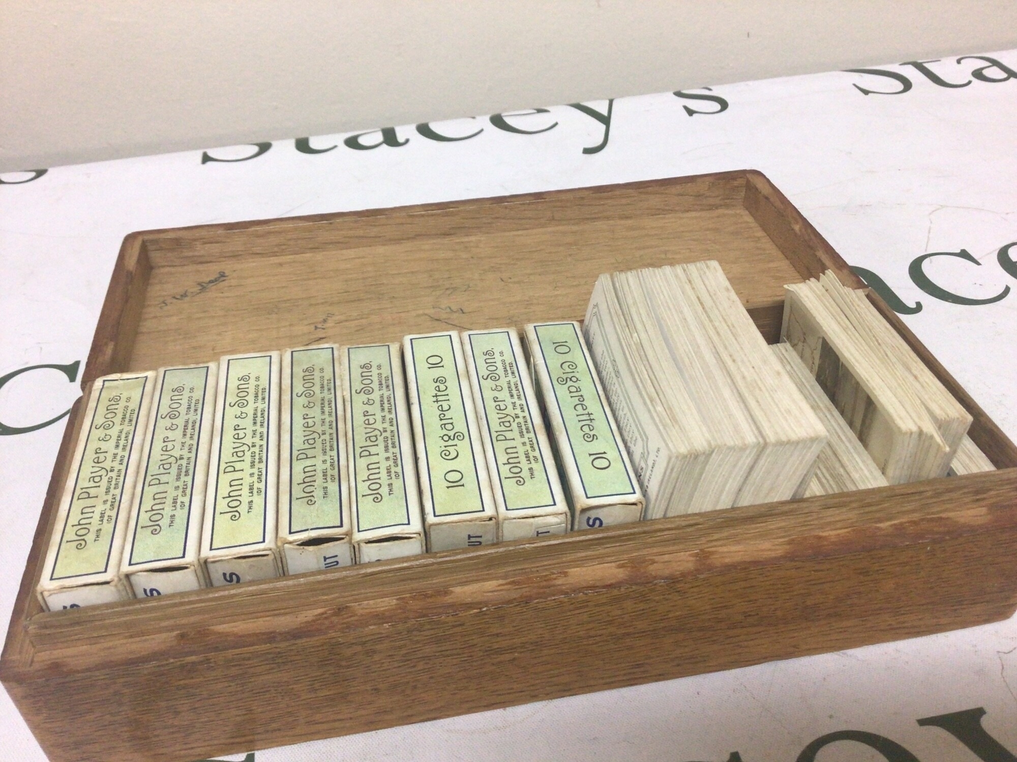A box containing a collection of sets of John Players Cigarette cards. NO RESERVE