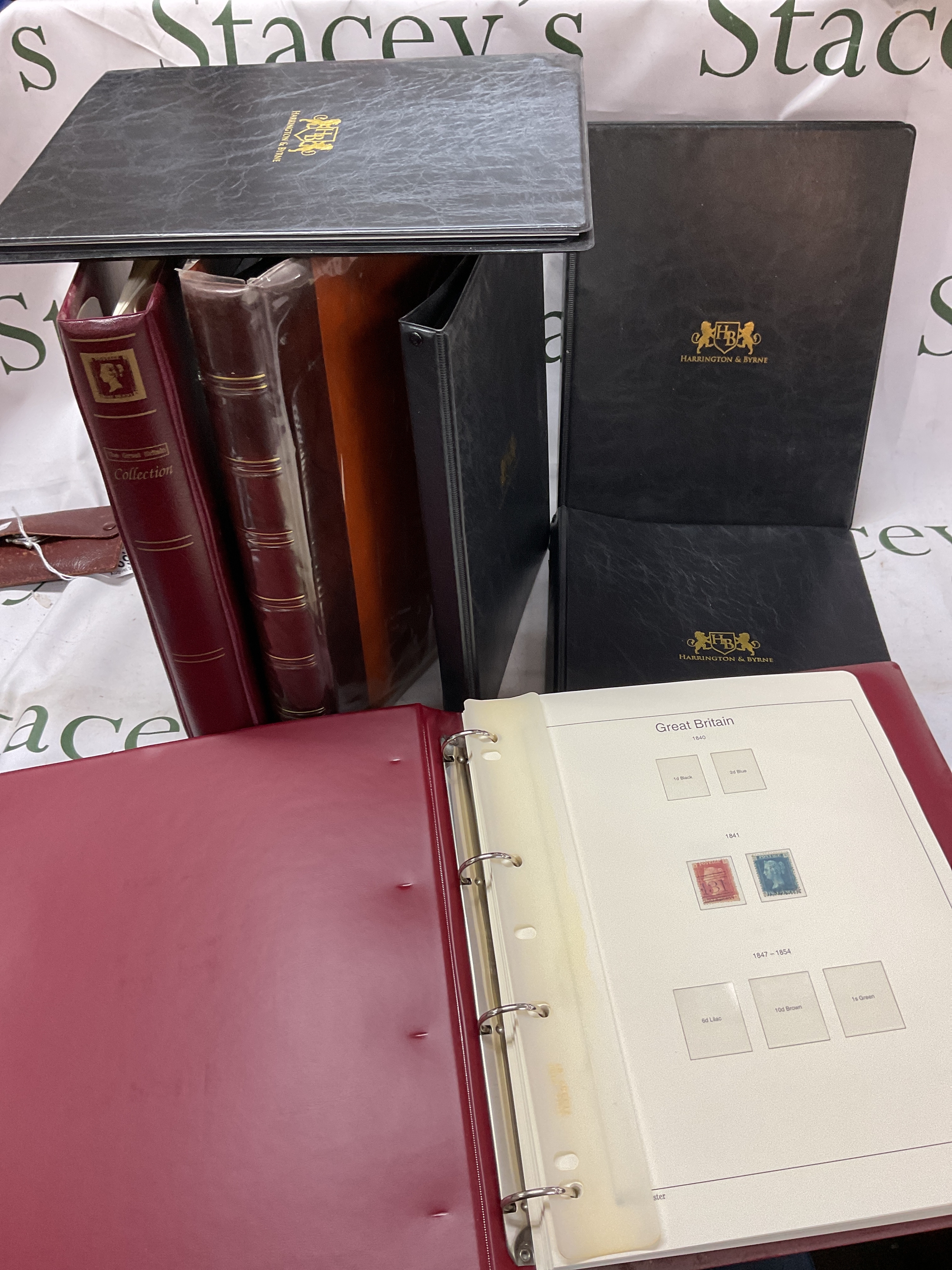 Seven albums of stamps to inc Victorian and Edwardian issues and four Harrington and Byrne folder sets of 