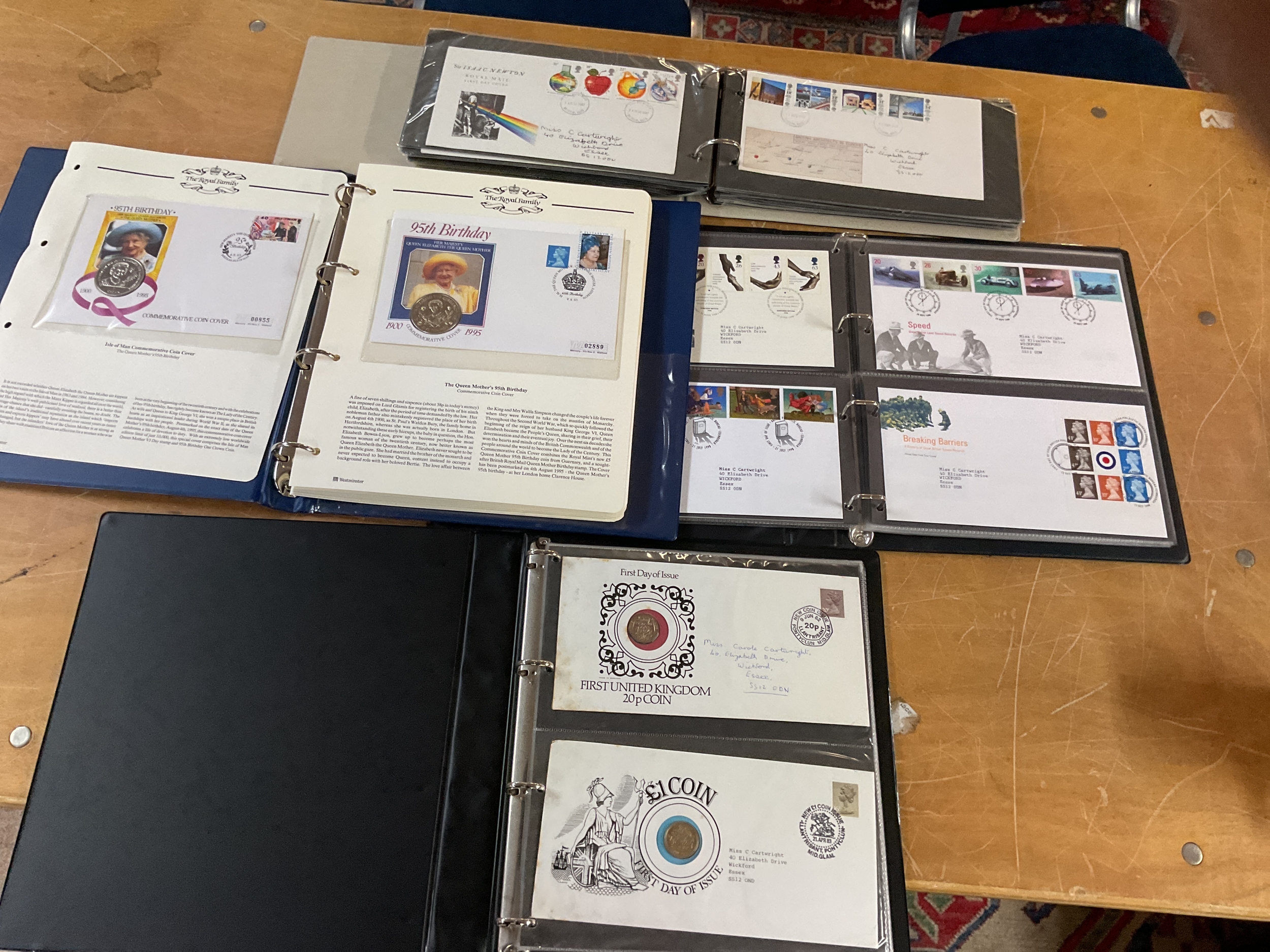 Four albums of stamps to inc FDCs and coin covers.