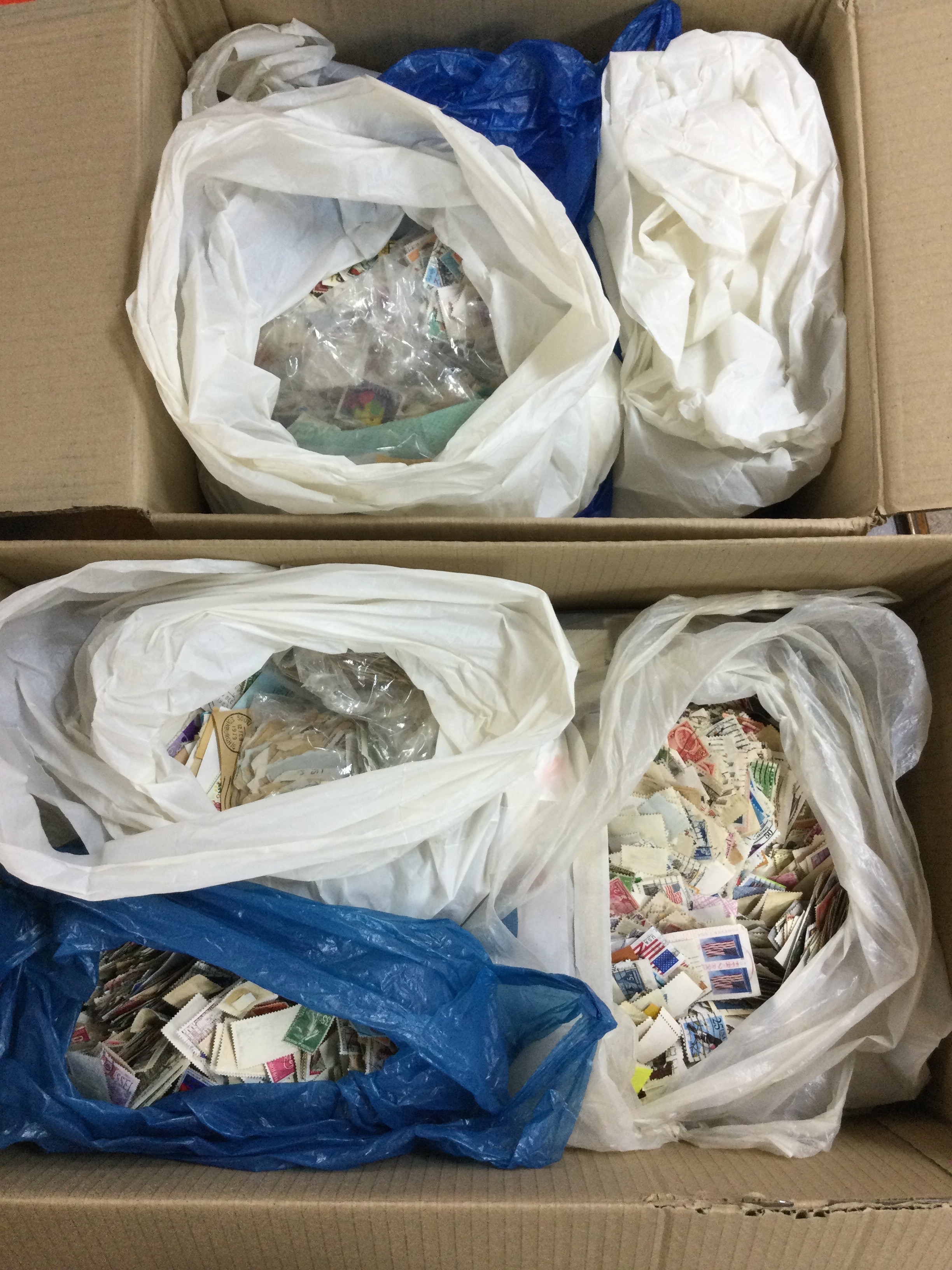 Two boxes of GB + commonwealth kiloware