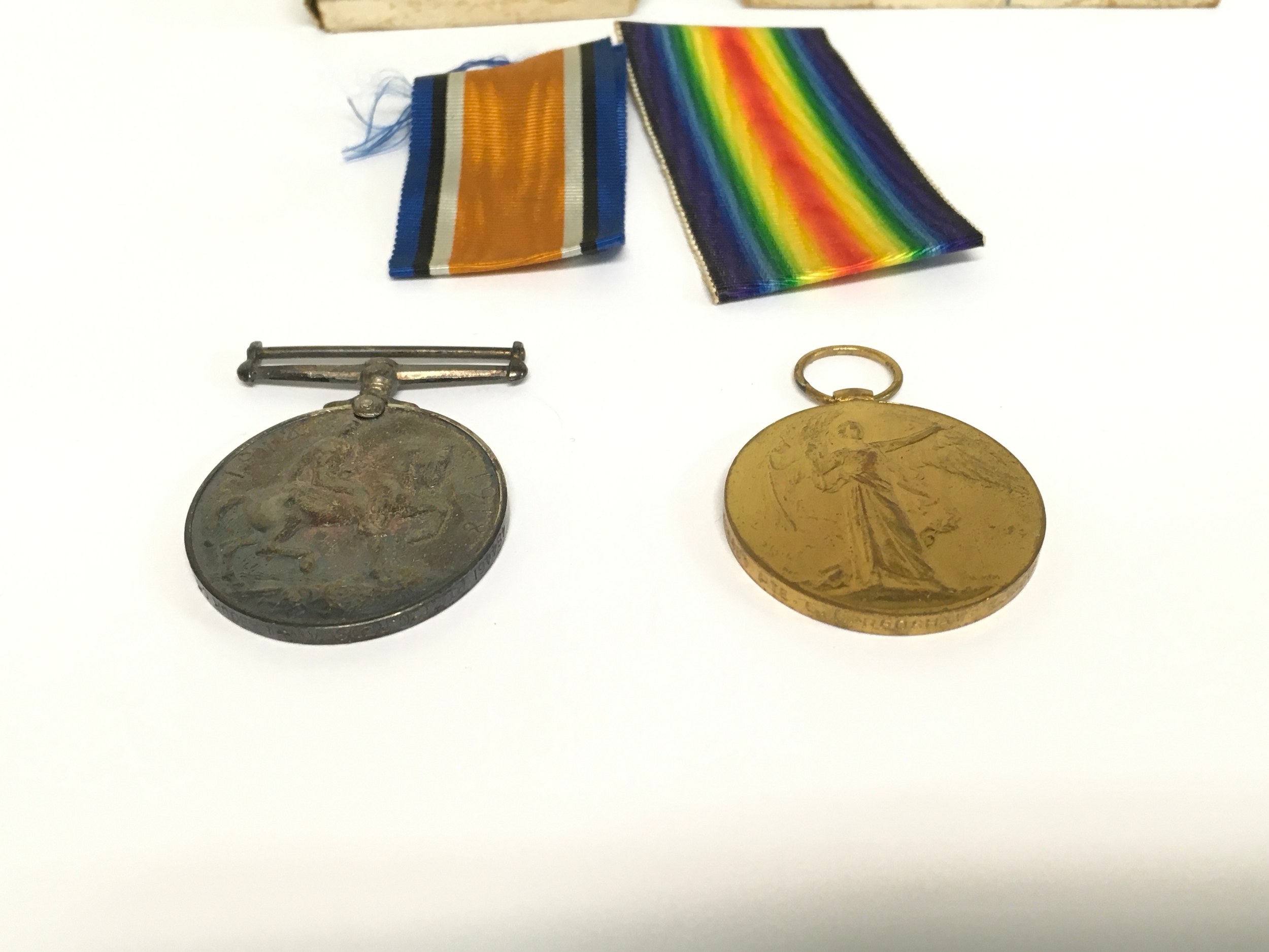A pair of world war 1 medals E G Redshaw labour corps.