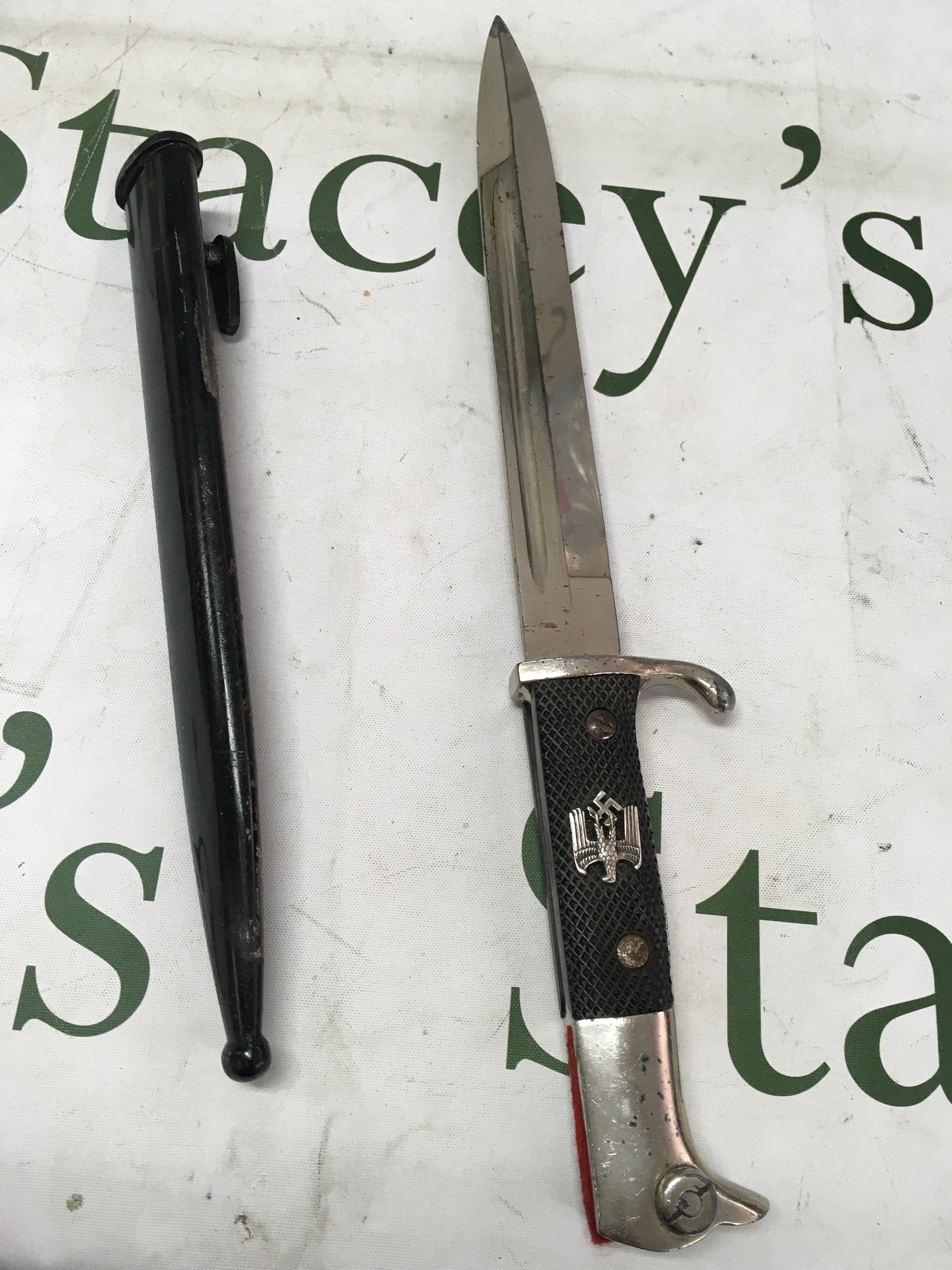 WWII German dress bayonet by E pack and sohue with National eagle attached to the handle.