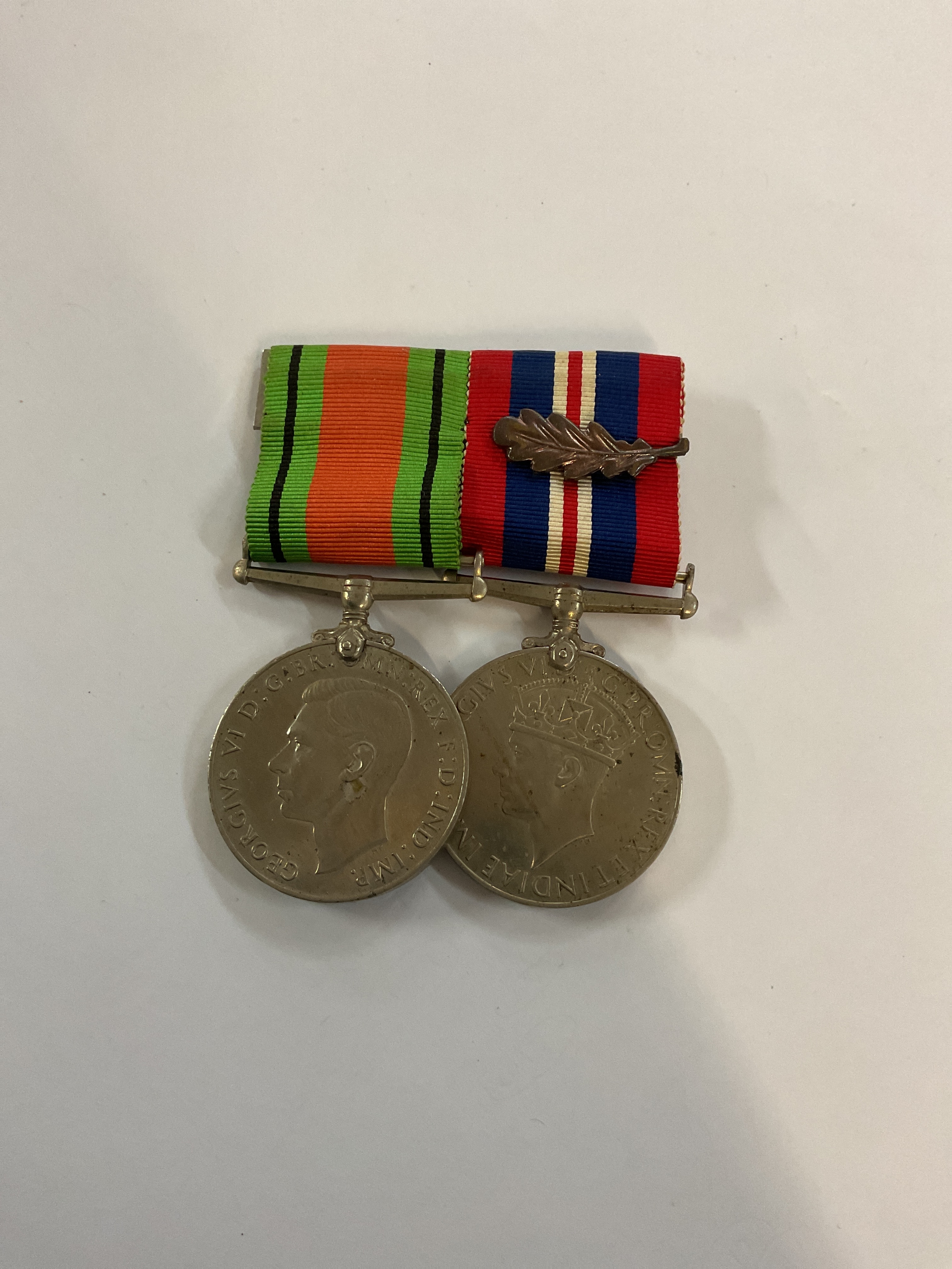 WWII Medals, court mounted DM & BWM with oak leaf.